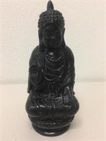 An Obsidian seated Buddha 16cms