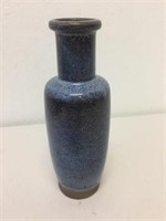 A Chinese blue glazed rouleau vase