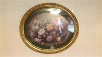 Oval frame with floral print