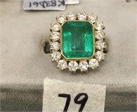 18K yellow gold emerald and diamond ring, weight o