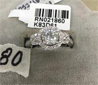 Platinum ring set with diamonds, weight of center