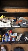 Contents of wall cabinet includes tools, aerosols