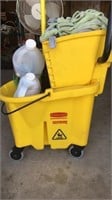 Mop bucket with wringer and cleaning chemicals