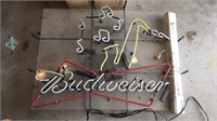 Budweiser bowtie and saxophone neon broken