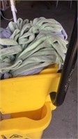 Mop bucket with wringer and cleaning chemicals