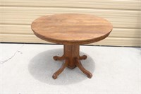 Round Pedestal Wood Dining Table