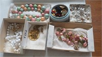 Costume jewelry; Necklaces and earrings
