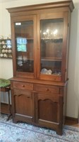 Cherry stepback cabinet with glass doors