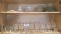 Group of drinking glasses and salad plates