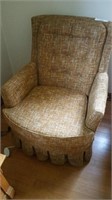 Brown rocking arm chair