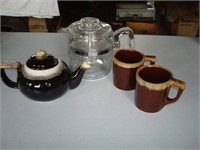 Coffee and Tea pots with mugs