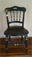 Black and gold accented  chair