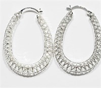 14B- Large sterling silver earrings $200