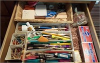 Office supplies - pens, pencils, tape, note pads