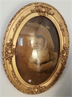 Domed glass oval picture frame