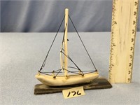 3 1/2" x 3" carved sailing vessel made of fossiliz