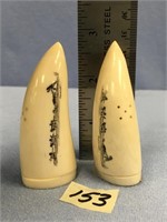 A pair of 2.5" white ivory tusk tips salt and pepp