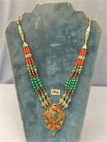 19" southwestern style, 4 strand necklace with cor