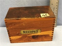An old wooden recipe box with dove tail joints