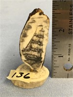 2 1/2" fossilized ivory tooth scrimmed with a sail