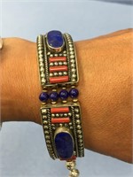 8" clasp bracelet, made of silver alloy with lapis