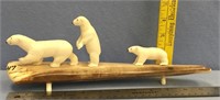 12" fossilized ivory tusk serving as a base for th