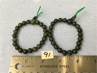 2 small jade bead stretch bracelets  (a 7)