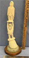A phenomenal 15" walrus tusk, carved into a totem,