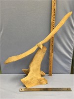 Fabulous bone carving of an eagle in flight, with