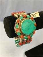 19" southwestern style, 4 strand bracelet with cor
