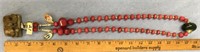 Natural ruby bead necklace with jade accents, pend