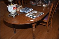 Lot #75 Antique Oak drop leaf dining table with