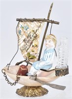 1893 COLUMBIAN EXPO BISQUE FIGURE IN BOAT PERFUME