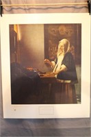 A Woman Weighing Gold by Jan Vermeer