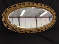 Oval Carved and Gilt Mirror L47" x W26"