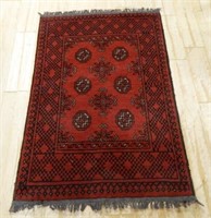 Hand Knotted Wool Throw Rug.