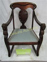 Carved Mahogany Rocker with Faces