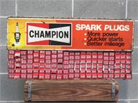 Champion Spark plug cabinet with spark plugs