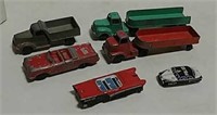 Small toy trucks and cars