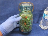 old green ball jar with 238 marbles (quart size)