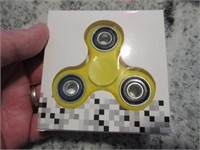 new in box - yellow fidget spinner