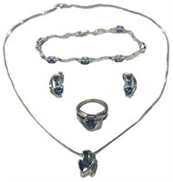 10K WHITE GOLD FOUR PIECE SAPPHIRE SET.