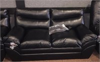 Simmons black leather love seat - brand new