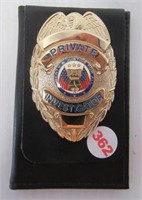 Private Investigator badge with holder.