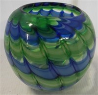 Heavy blown glass bowl. Measures 7" high.