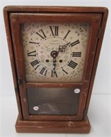 Eight day New England Clock Co. clock with key