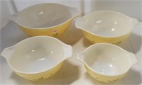 Set of (4) Graduating Cinderella Pyrex bowls.