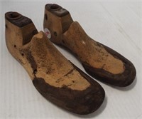 Pair of antique wood shoe molds. Measure 7.5"