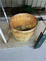 Two wooden 1/2 bushel baskets