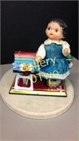 Vintage tin litho vinyl doll with xylophone wind